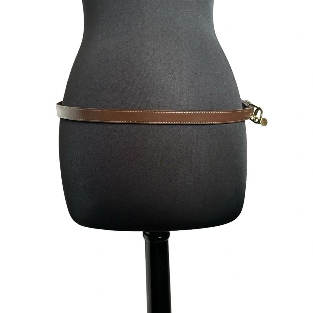 Vintage‎ leather music buckle belt. Made in the US. In good used condition